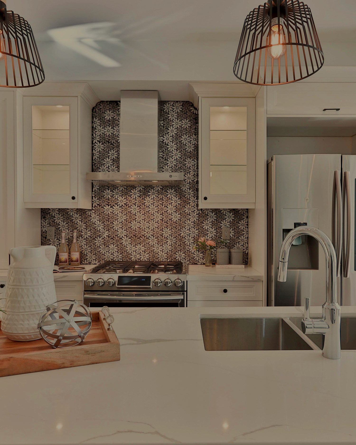 Newly renovated open-plan Vancouver kitchen with island and warm wood floors
